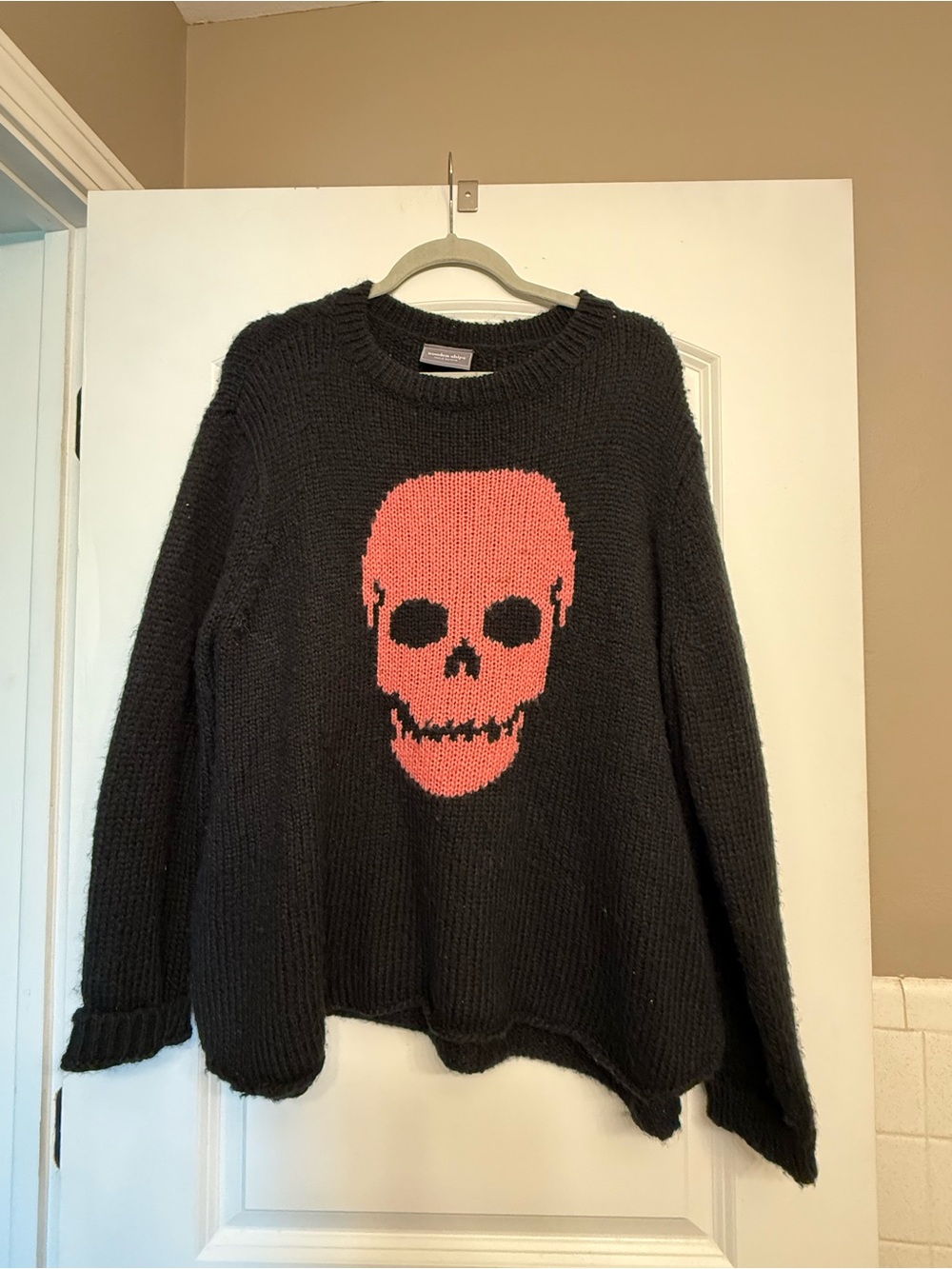 Wooden Ships Black Crewneck Sweater with Pink Skull Graphic